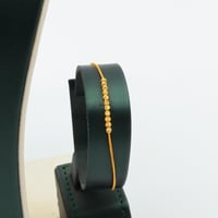 طقم ذهب الكرات عيار 21 – تصميم عصري أنيق بوزن 9.17...