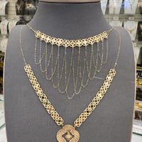 طقم ذه مع المخنق ناعم عيار 18 وزن 5.36 جرام