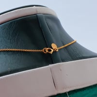 طقم ذهب كرات الدوريكاء عيار 21 وزن 10.83 جرام بتصم...