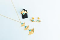 نصف طقم ذهب الرمش مطعم بالولو الفيروزي عيار 21 وزن...