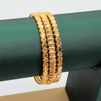 غوايش ذهب عيار 21 بكج وردة مع قصب السكر وزن 13.3 ج...