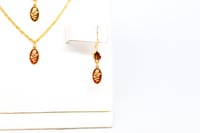 طقم ذهب سبيكة بيضاوي عيار 21