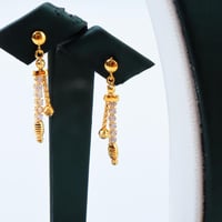 طقم ذهب مميز عيار 21 وزن 7.99 جرام بتصميم ناعم مع...