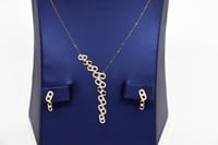 طقم ذهب مسيكاء عيار 18 وزن 4.1 جرام