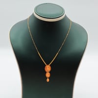 عقد ذهب عيار 21 زخارف دائرية وزن 1.29 جرام بتعليقة...