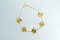 سوارة ذهب الفان كليف خمس وردات عيار 21 وزن 5.4 جرا...