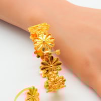 اسوارة مع خاتم ذهب عيار 21 وزن 19.3 جرام بتصميم ال...