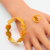 اسوارة مع خاتم ذهب عيار 21 وزن 19.3 جرام بتصميم ال...