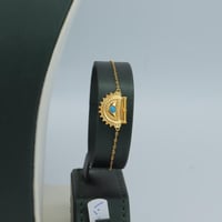 طقم ذهب الرمش عيار 21 مطعم بحبة لولو فيروزي وزن 10...