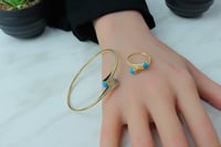 اسوارة مارلي ذهب مع خاتم بلون تيفاني تصميم ماسي عي...