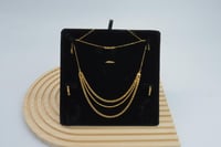 طقم ذهب ثلاثة دور عيار 21 وزن 12 جرام