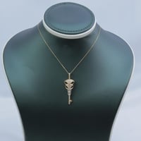 تعليقة ذهب عيار 18 مفتاح الألماس وزن 3.74 جرام