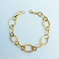 سوارة ذهب الحلقات تصميم 3D عيار 18 وزن 4.4 جرام