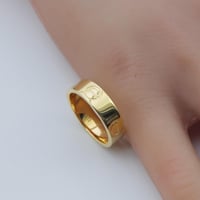 دبلة كارتير ذهب عيار 18 بتصميم اللوف العريض وزن 2....