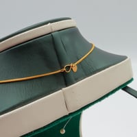 عقد ذهب كور ليزر عيار 21 وزن 7.65 جرام بتصميم فاخر