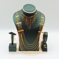 طقم ذهب المبروم سبعة أدوار صافي عيار 21 وزن 13.8 ج...