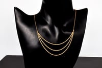 سلسال المبروم ثلاثة دور عيار 21 وزن 2.25 جرام