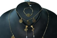 طقم ذهب نواعم تصميم الماسي عيار 18