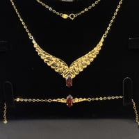 طقم جناح الصقر باللون الاحمر عيار 21