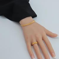 اسوارة مع خاتم ذهب عيار 21 بتصميم الدوريكاء وزن 7....