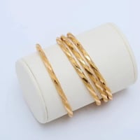 غوايش ذهب مبرومة عيار 21 سلاسة اللمعان وزن 6.3 جرا...