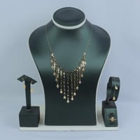 طقم ذهب تصميم السبيكة البيضاوي ناعم عيار 18 وزن 4....