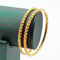 غوايش ذهب مبرومة عيار 21 لفّة الأناقة