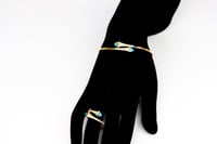 اسوارة مارلي ذهب تصميم الماسي باللون الفيروزي