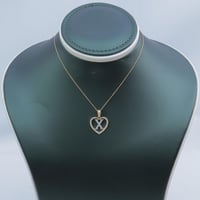 تعليقة ذهب عيار 18 قلب الألماس الناعم وزن 1.87 جرا...