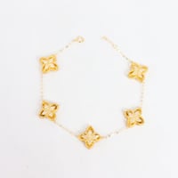 اسوارة ذهب روبيرتو كوين خمس وردات عيار 18 تصميم ال...