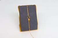 سوارة ذهب المبروم تصميم الحلقات عيار 18 وزن 1.6 جر...