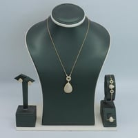 طقم ذهب البوشرون تصميم الماسي عيار 18 وزن 9.92 جرا...