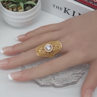 خاتم ذهب كبير عيار 21 موديل غصن الزيتون بتصميم الم...