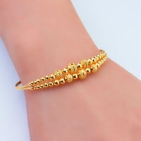 اسوارة ذهب بتفاصيل كروية أنيقة عيار 21 وزن 6.97 جر...