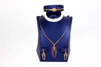 طقم ذهب عيار 21 تصميم حبات الدوريكاء بوزن 13.4 جرا...