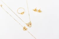 طقم ذهب عيار 18 تصميم بانثر دو كارتيه