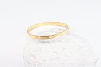 سوارة ذهب روبيرتو كوين تصميم الماسي عيار 18 وزن 9....