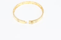 سوارة ذهب روبيرتو كوين تصميم الماسي عيار 18 وزن 9....