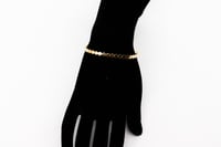 اسوارة شومية ذهب عيار 18 المميز لأطلالة جذابة