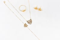 طقم ذهب عيار 18 تصميم بانثر دو كارتيه