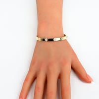 سوارة ذهب روبيرتو كوين تصميم الماسي عيار 18 وزن 9....