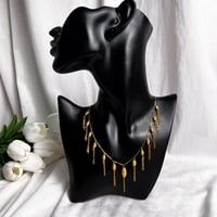 مخنق ذهب عيار 21 تصميم كرات الدوريكاء وزن 14.4 جرا...