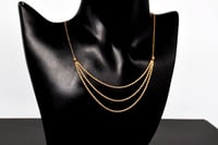 سلسال المبروم ثلاثة دور عيار 21 وزن 1.9 جرام