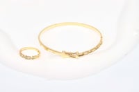 اسوارة كارتير ذهب مع خاتم فاخر عيار 18 وزن 9.4 جرا...