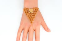 كف ذهب المنثورة عيار 21 بتصميم حبة الجنية بوزن 15....