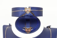 طقم ذهب عيار 18 تصميم بانثر دو كارتيه