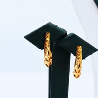 طقم ذهب تصميم غصن الزيتون عيار 21 وزن 8.11 جرام