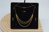 طقم ذهب ثلاثة دور عيار 21 وزن 12 جرام