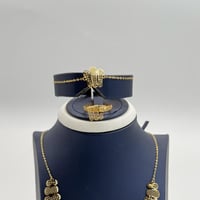 طقم طوق عيار 21 وزن 10.2 جرام