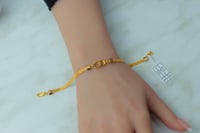 اسوارة ذهب عيار 21 تصميم الCD بنقش القوتشي